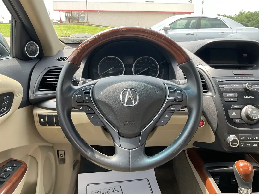 2014 Acura RDX Base (5J8TB3H39EL) with an Other engine, located at 880 E. National Road, Vandalia, OH, 45377, (937) 908-9800, 39.891918, -84.183594 - Unleash the perfect blend of comfort and versatility with the 2014 Acura RDX, a crossover that caters to both your daily grind and weekend adventures. Whether you're a growing family seeking spaciousness, a commuter looking for reliability, or a weekend warrior ready for road trips, this vehicle has - Photo#16
