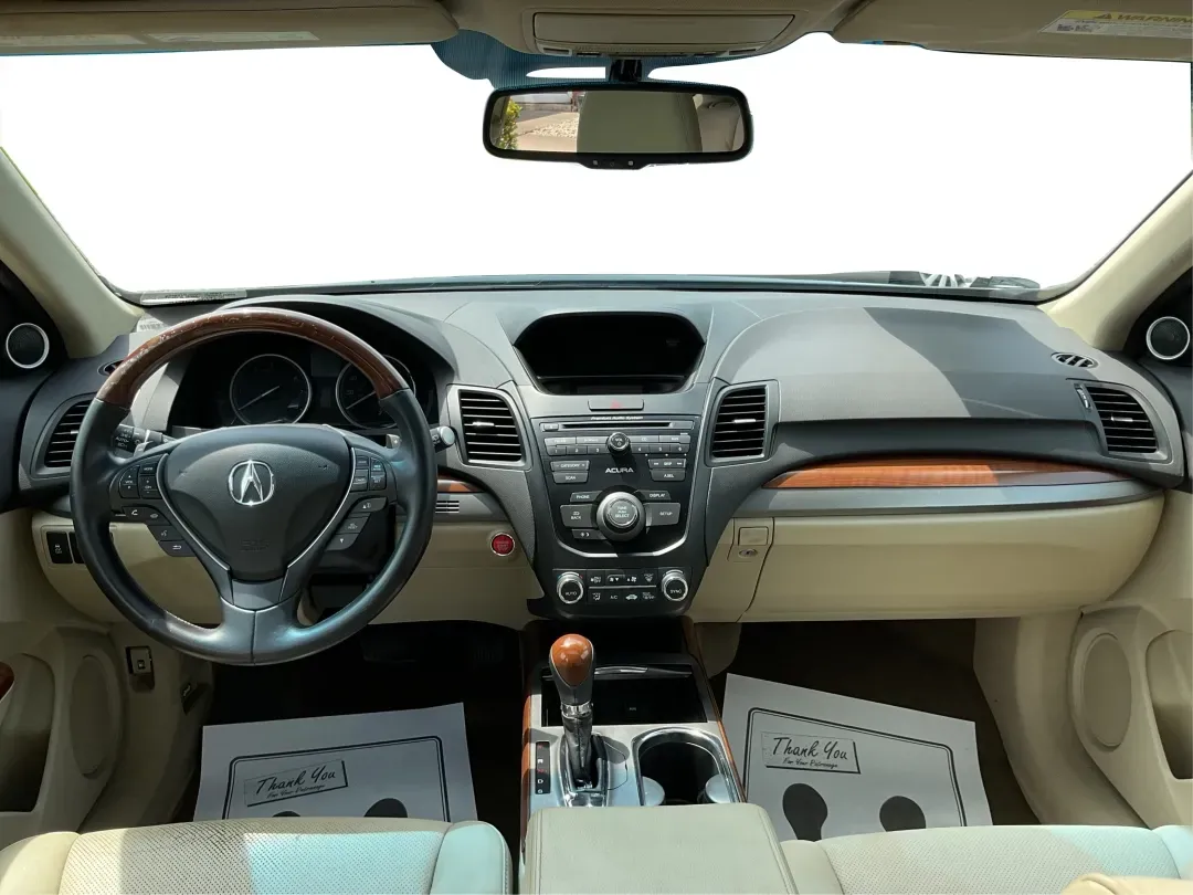 2014 Acura RDX Base (5J8TB3H39EL) with an Other engine, located at 880 E. National Road, Vandalia, OH, 45377, (937) 908-9800, 39.891918, -84.183594 - Unleash the perfect blend of comfort and versatility with the 2014 Acura RDX, a crossover that caters to both your daily grind and weekend adventures. Whether you're a growing family seeking spaciousness, a commuter looking for reliability, or a weekend warrior ready for road trips, this vehicle has - Photo#20