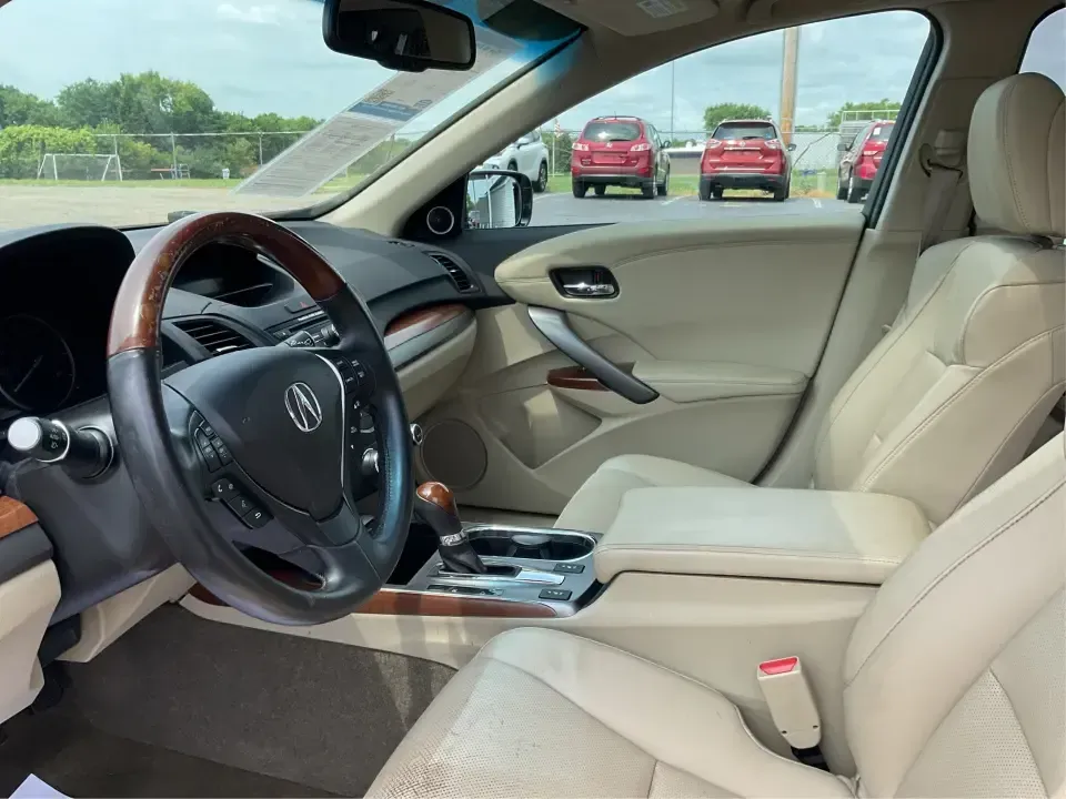 2014 Acura RDX Base (5J8TB3H39EL) with an 2.3L L4 DOHC 16V engine, 6-Speed Automatic transmission, located at 401 Woodman Dr, Riverside, OH, 45431, (937) 908-9800, 39.760899, -84.123421 - Unleash the perfect blend of comfort and versatility with the 2014 Acura RDX, a crossover that caters to both your daily grind and weekend adventures. Whether you're a growing family seeking spaciousness, a commuter looking for reliability, or a weekend warrior ready for road trips, this vehicle has - Photo#9