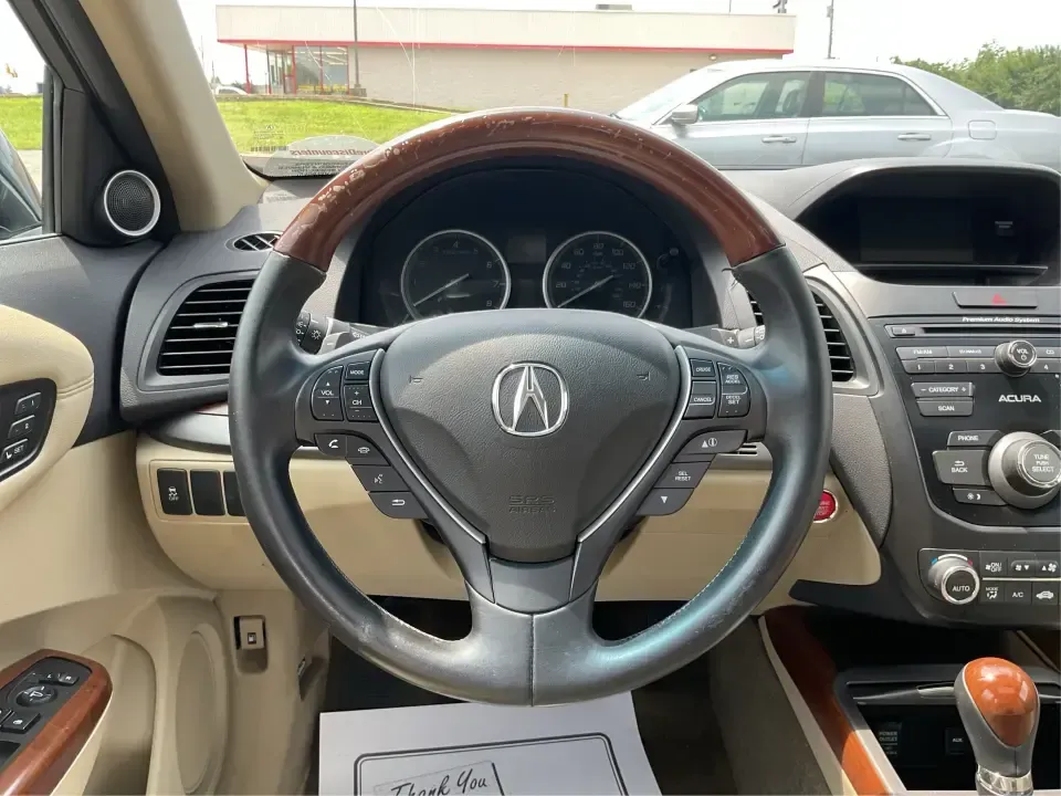 2014 Acura RDX Base (5J8TB3H39EL) with an 2.3L L4 DOHC 16V engine, 6-Speed Automatic transmission, located at 401 Woodman Dr, Riverside, OH, 45431, (937) 908-9800, 39.760899, -84.123421 - Unleash the perfect blend of comfort and versatility with the 2014 Acura RDX, a crossover that caters to both your daily grind and weekend adventures. Whether you're a growing family seeking spaciousness, a commuter looking for reliability, or a weekend warrior ready for road trips, this vehicle has - Photo#16