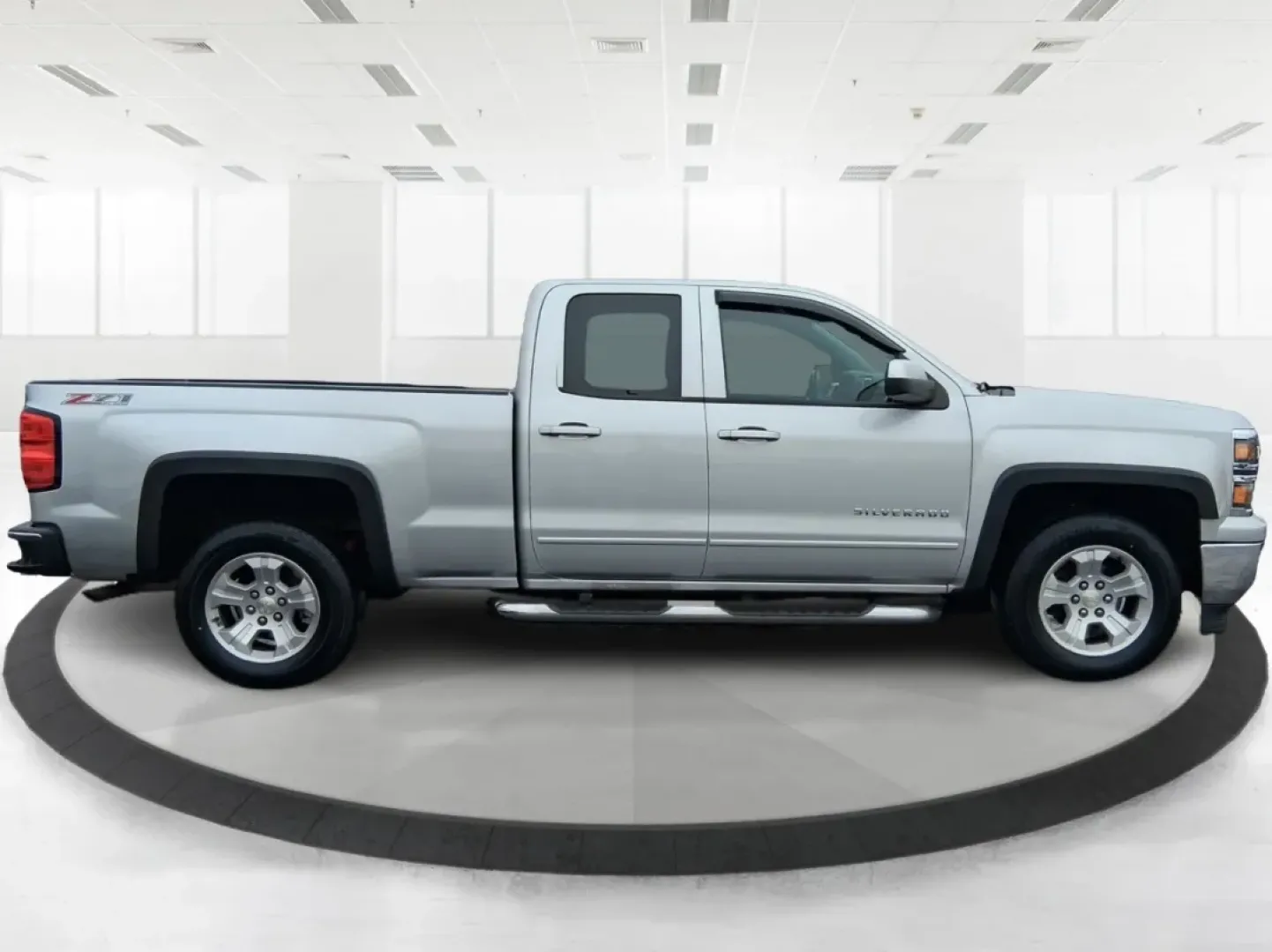 2015 Silver Chevrolet Silverado 1500 LT Double Cab 4WD (1GCVKREC6FZ) with an 5.3L V8 OHV 16V engine, 6-Speed Automatic transmission, located at 1951 S Dayton Lakeview Rd., New Carlisle, OH, 45344, (937) 908-9800, 39.890999, -84.050255 - Picture your next weekend: you've got a project list to tackle, a trailer to hook up, and a quick escape planned after work-maybe a run out toward Springfield or a backroad cruise near the Mad River. If you need a truck that fits real life in Clark County, this **2015 Chevrolet Silverado 1500 LT Dou - Photo#1