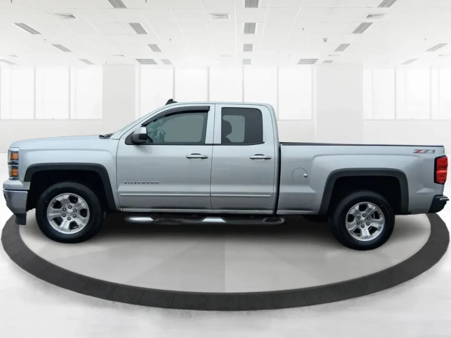2015 Silver Chevrolet Silverado 1500 LT Double Cab 4WD (1GCVKREC6FZ) with an 5.3L V8 OHV 16V engine, 6-Speed Automatic transmission, located at 1951 S Dayton Lakeview Rd., New Carlisle, OH, 45344, (937) 908-9800, 39.890999, -84.050255 - Picture your next weekend: you've got a project list to tackle, a trailer to hook up, and a quick escape planned after work-maybe a run out toward Springfield or a backroad cruise near the Mad River. If you need a truck that fits real life in Clark County, this **2015 Chevrolet Silverado 1500 LT Dou - Photo#5