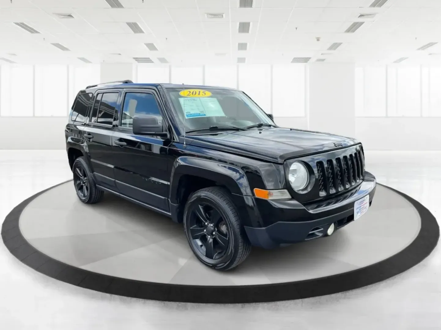 2015 Black Clearcoat Jeep Patriot Sport 2WD (1C4NJPBA6FD) with an 2.0L L4 DOHC 16V engine, located at 1099 N County Rd 25A, Troy, OH, 45373, (937) 908-9800, 40.057079, -84.212883 - **Adventure Awaits in the 2015 Jeep Patriot Your Perfect Companion for Weekend Getaways!**<br /> <br /> Imagine hitting the open road with the wind in your hair, the sound of your favorite playlist filling the cabin, and the freedom to explore every hidden gem along the way. The 2015 Jeep Patriot i - Photo#0