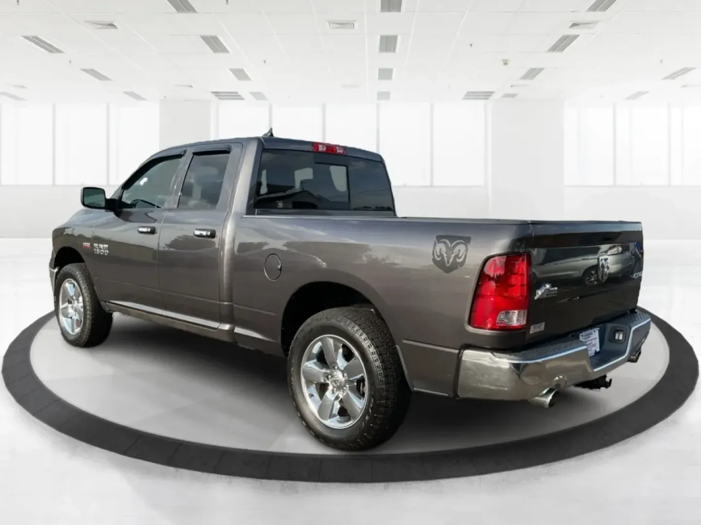 2015 Gray Ram 1500 SLT Quad Cab 4WD (1C6RR7GT3FS) with an 5.7L V8 OHV 16V engine, 8-Speed Automatic transmission, located at 1099 N County Rd 25A, Troy, OH, 45373, (937) 908-9800, 40.057079, -84.212883 - **Experience Adventure and Utility with this 2015 Ram 1500 SLT Quad Cab!**<br /> <br /> Are you ready to elevate your weekend adventures while ensuring your daily commute remains smooth and comfortable? Look no further than this robust 2015 Ram 1500 SLT Quad Cab, now available at Advantage Car and C - Photo#4