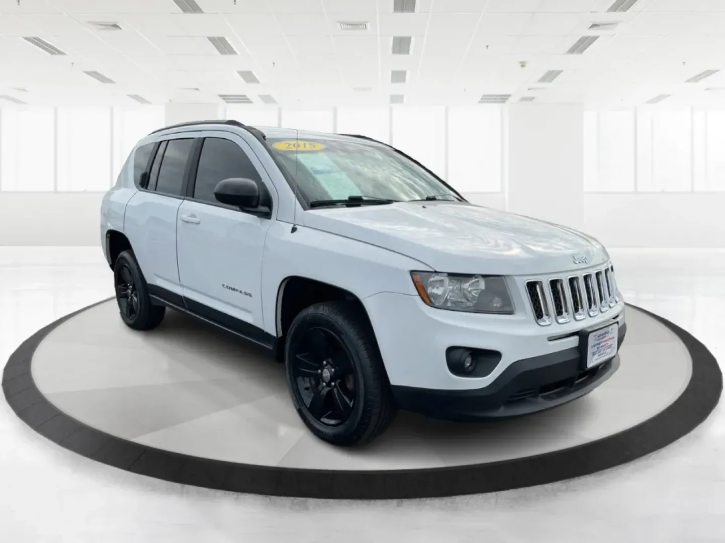 2015 Jeep Compass Sport (1C4NJDBB6FD) with an 2.4L I-4 DOHC engine, located at 880 E. National Road, Vandalia, OH, 45377, (937) 908-9800, 39.891918, -84.183594 - **Explore Adventure and Comfort with the 2015 Jeep Compass Sport at Advantage Car and Credit!**<br /> <br /> Whether you're navigating your daily commute or embarking on a weekend getaway, the 2015 Jeep Compass Sport is designed with versatility in mind. With a spacious interior and rugged capabilit - Photo#0