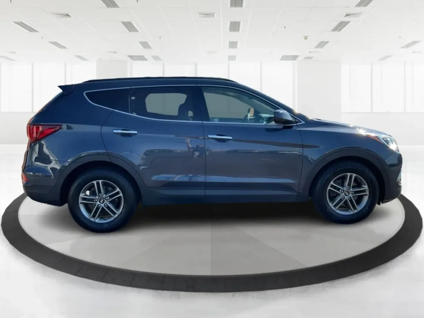 2017 Marlin Blue Hyundai Santa Fe Sport 2.4 FWD (5NMZU3LB6HH) with an 2.4L L4 DOHC 16V engine, 6-Speed Automatic transmission, located at 4508 South Dixie Dr, Moraine, OH, 45439, (937) 908-9800, 39.689976, -84.218452 - **Explore Adventure with the 2017 Hyundai Santa Fe - Perfect for Families and Weekend Warriors!**<br /> <br /> Are you in search of a versatile SUV that can handle everything from family road trips to daily commutes? Look no further! The 2017 Hyundai Santa Fe, featuring a stunning Marlin Blue exteri - Photo#1