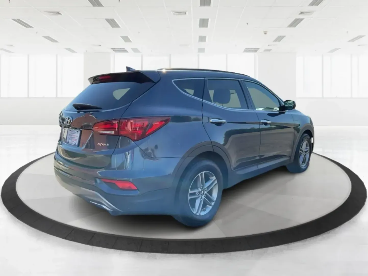 2017 Marlin Blue Hyundai Santa Fe Sport 2.4 FWD (5NMZU3LB6HH) with an 2.4L L4 DOHC 16V engine, 6-Speed Automatic transmission, located at 4508 South Dixie Dr, Moraine, OH, 45439, (937) 908-9800, 39.689976, -84.218452 - **Explore Adventure with the 2017 Hyundai Santa Fe - Perfect for Families and Weekend Warriors!**<br /> <br /> Are you in search of a versatile SUV that can handle everything from family road trips to daily commutes? Look no further! The 2017 Hyundai Santa Fe, featuring a stunning Marlin Blue exteri - Photo#2