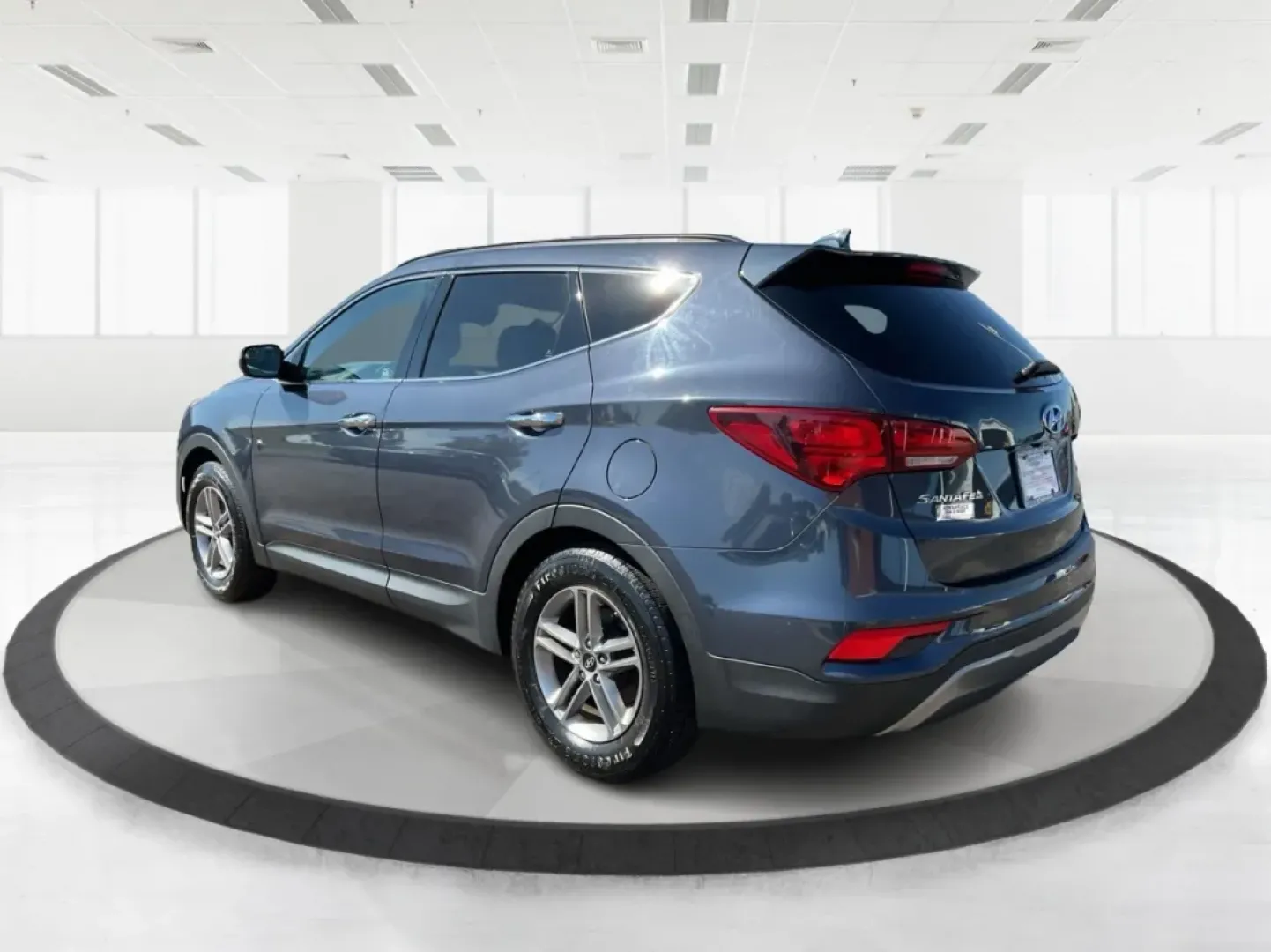 2017 Marlin Blue Hyundai Santa Fe Sport 2.4 FWD (5NMZU3LB6HH) with an 2.4L L4 DOHC 16V engine, 6-Speed Automatic transmission, located at 4508 South Dixie Dr, Moraine, OH, 45439, (937) 908-9800, 39.689976, -84.218452 - **Explore Adventure with the 2017 Hyundai Santa Fe - Perfect for Families and Weekend Warriors!**<br /> <br /> Are you in search of a versatile SUV that can handle everything from family road trips to daily commutes? Look no further! The 2017 Hyundai Santa Fe, featuring a stunning Marlin Blue exteri - Photo#4