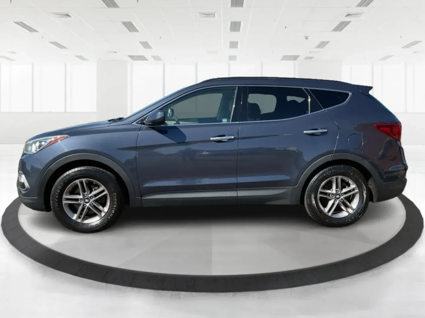 2017 Marlin Blue Hyundai Santa Fe Sport 2.4 FWD (5NMZU3LB6HH) with an 2.4L L4 DOHC 16V engine, 6-Speed Automatic transmission, located at 4508 South Dixie Dr, Moraine, OH, 45439, (937) 908-9800, 39.689976, -84.218452 - **Explore Adventure with the 2017 Hyundai Santa Fe - Perfect for Families and Weekend Warriors!**<br /> <br /> Are you in search of a versatile SUV that can handle everything from family road trips to daily commutes? Look no further! The 2017 Hyundai Santa Fe, featuring a stunning Marlin Blue exteri - Photo#5