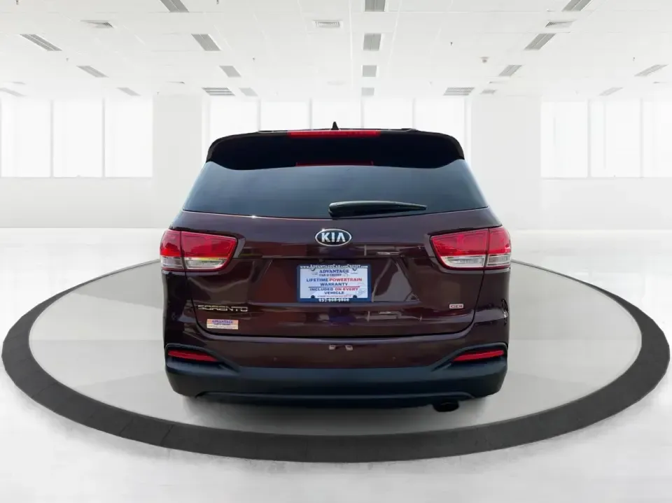 2017 Burgundy Kia Sorento L 2WD (5XYPG4A31HG) with an 2.4L L4 DOHC 16V engine, 6-Speed Automatic transmission, located at 4508 South Dixie Dr, Moraine, OH, 45439, (937) 908-9800, 39.689976, -84.218452 - Pack up the kids, load the groceries, and still have room for a spontaneous weekend escape to Carillon Historical Park or a day exploring Cox Arboretum-this 2017 Kia Sorento L 2WD is the kind of practical SUV that fits real Moraine and Dayton-area life. With three-row versatility in a midsize footpr - Photo#3