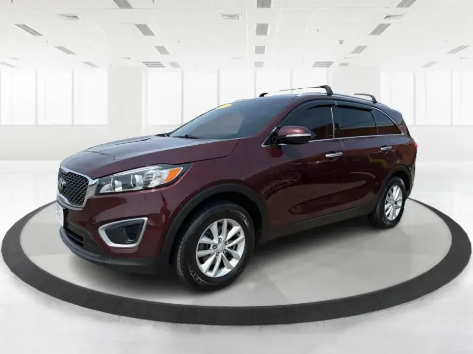 2017 Burgundy Kia Sorento L 2WD (5XYPG4A31HG) with an 2.4L L4 DOHC 16V engine, 6-Speed Automatic transmission, located at 4508 South Dixie Dr, Moraine, OH, 45439, (937) 908-9800, 39.689976, -84.218452 - Pack up the kids, load the groceries, and still have room for a spontaneous weekend escape to Carillon Historical Park or a day exploring Cox Arboretum-this 2017 Kia Sorento L 2WD is the kind of practical SUV that fits real Moraine and Dayton-area life. With three-row versatility in a midsize footpr - Photo#8