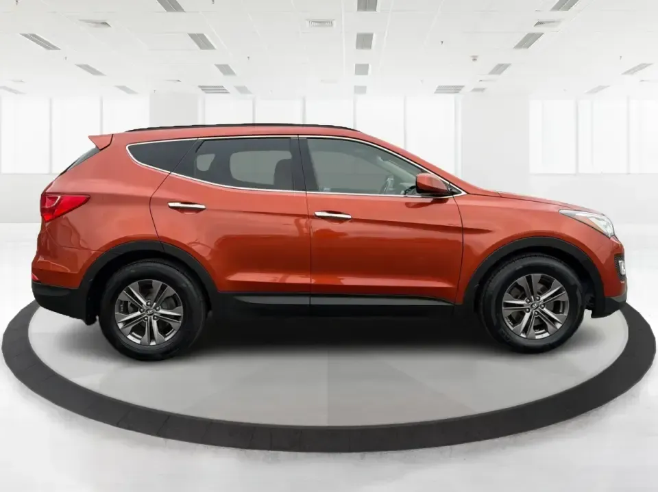 2013 Hyundai Santa Fe Sport 2.4 AWD (5XYZUDLB7DG) with an 2.4L L4 DOHC 16V engine, 6-Speed Automatic transmission, located at 401 Woodman Dr, Riverside, OH, 45431, (937) 908-9800, 39.760899, -84.123421 - **Experience the Freedom of Adventure with the 2013 Hyundai Santa Fe Sport AWD at Advantage Car and Credit - Riverside!**<br /> <br /> Are you ready to elevate your family's adventures or tackle your daily commutes with style and comfort? The 2013 Hyundai Santa Fe Sport 2.4 AWD is the perfect vehicl - Photo#1