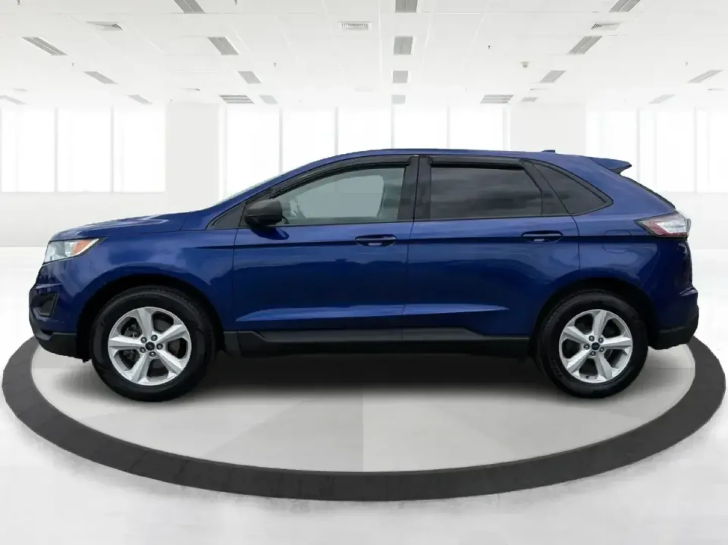 2015 Ford Edge SE FWD (2FMTK3G98FB) with an 2.0L L4 DOHC 16V engine, 6-Speed Automatic transmission, located at 401 Woodman Dr, Riverside, OH, 45431, (937) 908-9800, 39.760899, -84.123421 - Need an SUV that fits real life in the Miami Valley-school drop-offs, a steady commute down I75, and weekend errands that somehow turn into a full cargo load? This 2015 Ford Edge SE FWD is built for everyday versatility, with comfortable seating for five, a roomy cabin, and practical tech that helps- Photo#5