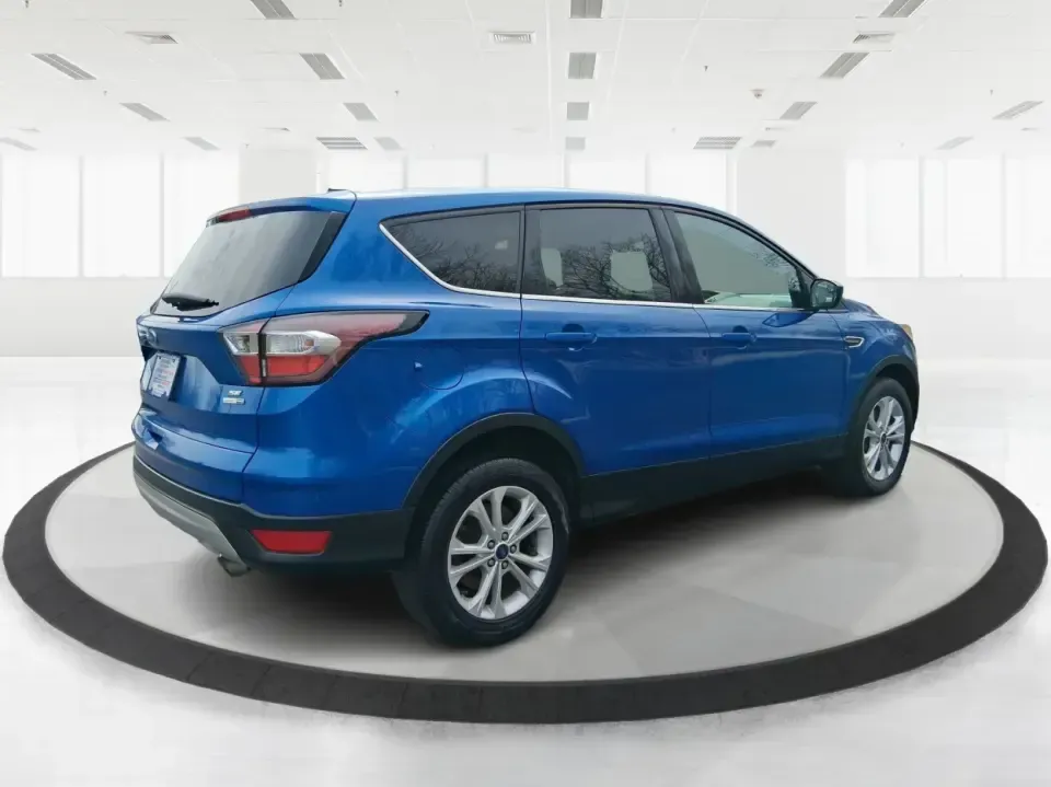 2017 Ford Escape SE 4WD (1FMCU9G93HU) with an 2.0L L4 DOHC 16V engine, 6-Speed Automatic transmission, located at 1099 N County Rd 25A, Troy, OH, 45373, (937) 908-9800, 40.057079, -84.212883 - Discover the ultimate blend of comfort, capability, and style with the 2017 Ford Escape SE 4WD, a perfect companion for families on the go or adventurers seeking their next weekend thrill. With its spacious interior and robust features, this SUV is designed for those who lead an active lifestyle, ma - Photo#2