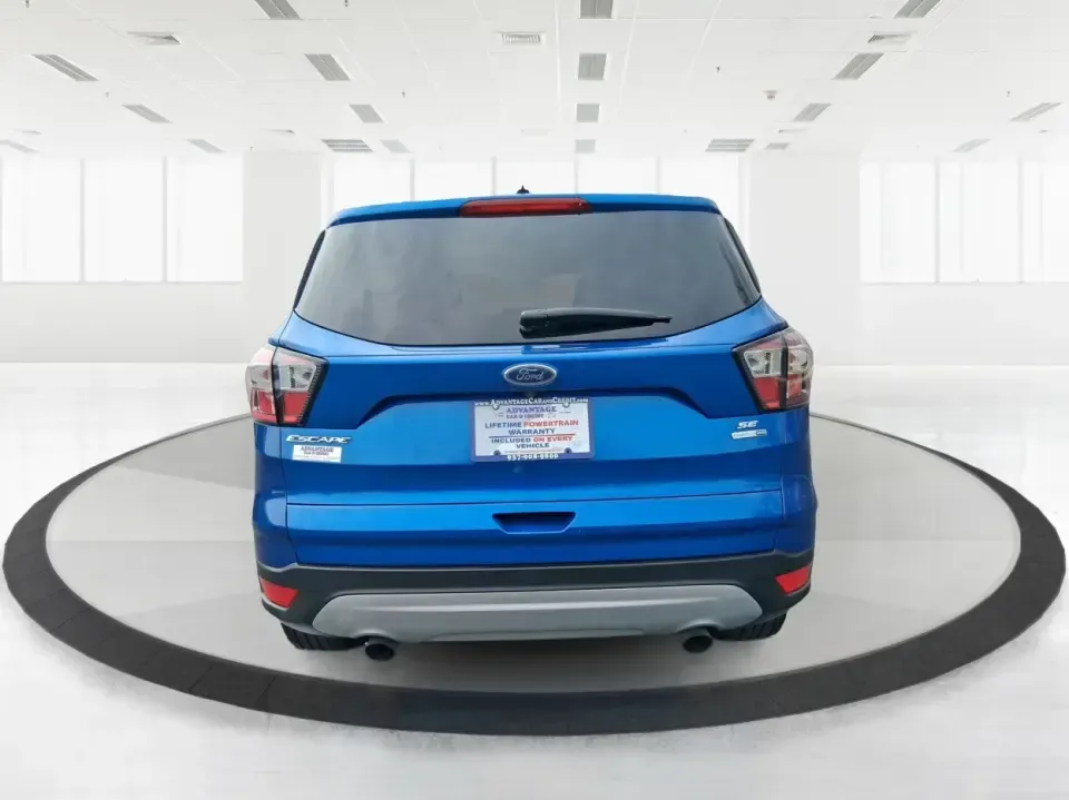 2017 Ford Escape SE 4WD (1FMCU9G93HU) with an 2.0L L4 DOHC 16V engine, 6-Speed Automatic transmission, located at 1099 N County Rd 25A, Troy, OH, 45373, (937) 908-9800, 40.057079, -84.212883 - Discover the ultimate blend of comfort, capability, and style with the 2017 Ford Escape SE 4WD, a perfect companion for families on the go or adventurers seeking their next weekend thrill. With its spacious interior and robust features, this SUV is designed for those who lead an active lifestyle, ma - Photo#3