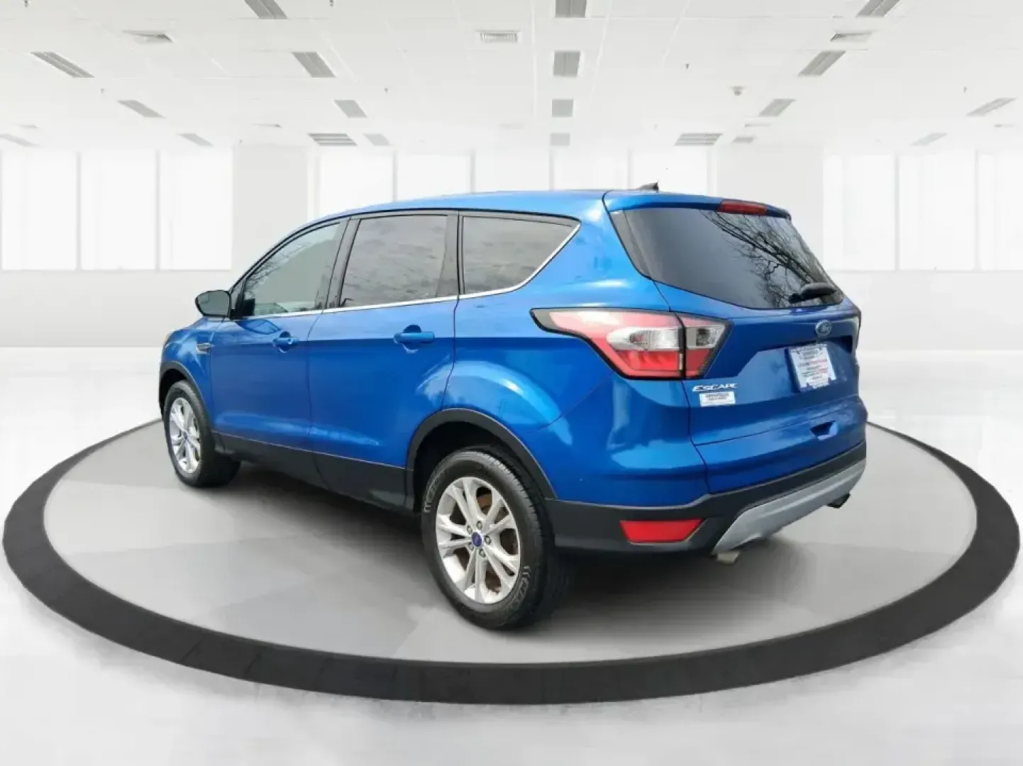 2017 Ford Escape SE 4WD (1FMCU9G93HU) with an 2.0L L4 DOHC 16V engine, 6-Speed Automatic transmission, located at 1099 N County Rd 25A, Troy, OH, 45373, (937) 908-9800, 40.057079, -84.212883 - Discover the ultimate blend of comfort, capability, and style with the 2017 Ford Escape SE 4WD, a perfect companion for families on the go or adventurers seeking their next weekend thrill. With its spacious interior and robust features, this SUV is designed for those who lead an active lifestyle, ma - Photo#4