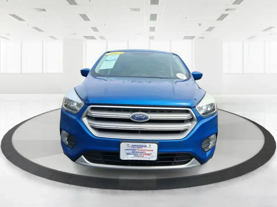 2017 Ford Escape SE 4WD (1FMCU9G93HU) with an 2.0L L4 DOHC 16V engine, 6-Speed Automatic transmission, located at 1099 N County Rd 25A, Troy, OH, 45373, (937) 908-9800, 40.057079, -84.212883 - Discover the ultimate blend of comfort, capability, and style with the 2017 Ford Escape SE 4WD, a perfect companion for families on the go or adventurers seeking their next weekend thrill. With its spacious interior and robust features, this SUV is designed for those who lead an active lifestyle, ma - Photo#7