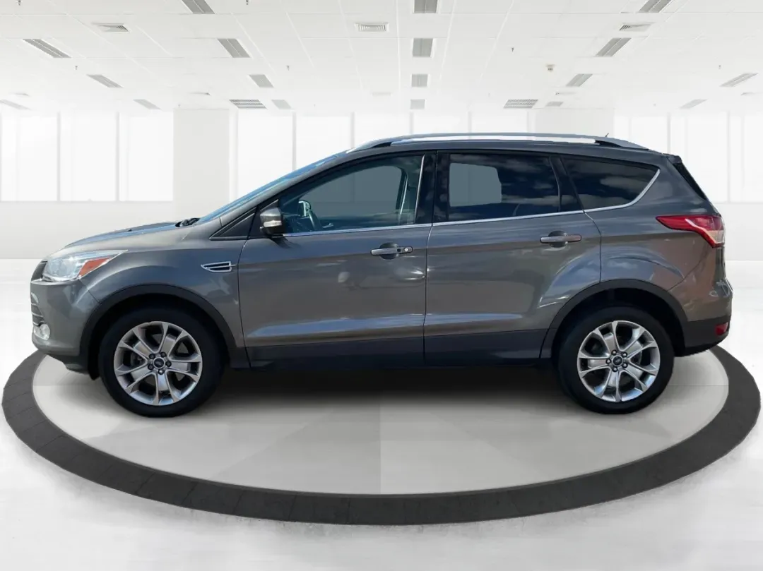 2014 Ford Escape Titanium 4WD (1FMCU9J92EU) with an 2.0L L4 DOHC 16V engine, 6-Speed Automatic transmission, located at 401 Woodman Dr, Riverside, OH, 45431, (937) 908-9800, 39.760899, -84.123421 - Looking for a versatile vehicle that accommodates your dynamic lifestyle? Meet the 2014 Ford Escape Titanium, the perfect SUV for growing families, adventurous souls, and budget-conscious buyers alike! With its impressive blend of performance, comfort, and cutting-edge technology, this Ford Escape i - Photo#5