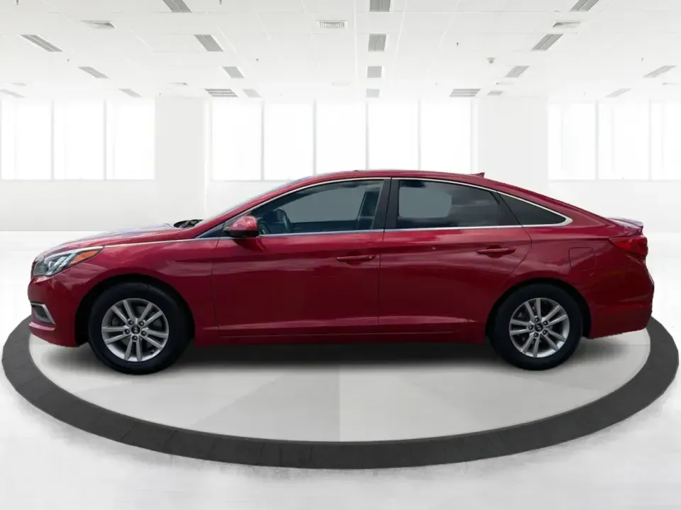 2017 Hyundai Sonata SE (5NPE24AF8HH) with an 2.4L L4 DOHC 16V engine, 7-Speed Automatic transmission, located at 8750 N County Rd 25A, Piqua, OH, 45356, (937) 908-9800, 40.164391, -84.232513 - Ready for a dependable commuter that still looks sharp pulling into work, school pickup, or a weekend dinner in town? This Scarlet Red 2017 Hyundai Sonata SE is a practical, comfortable sedan that fits real-life schedules in Piqua, Ohio-whether you're cruising up N County Rd 25A, heading toward I75 - Photo#5