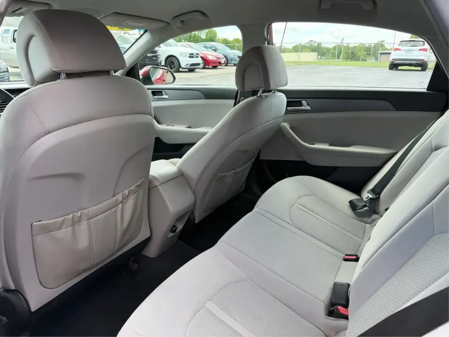 2017 Hyundai Sonata SE (5NPE24AF8HH) with an 2.4L L4 DOHC 16V engine, 7-Speed Automatic transmission, located at 1951 S Dayton Lakeview Rd., New Carlisle, OH, 45344, (937) 908-9800, 39.890999, -84.050255 - Ready for a dependable commuter that still looks sharp pulling into work, school pickup, or a weekend dinner in town? This Scarlet Red 2017 Hyundai Sonata SE is a practical, comfortable sedan that fits real-life schedules in Piqua, Ohio-whether you're cruising up N County Rd 25A, heading toward I75 - Photo#10