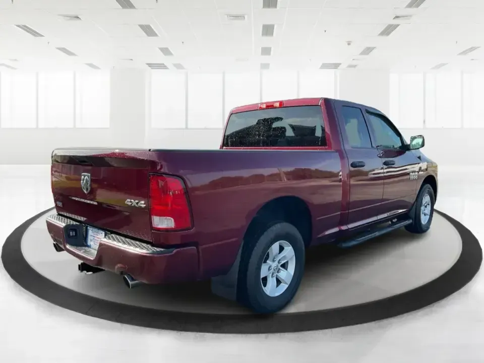 2018 Ram 1500 Express Quad Cab 4x4 6'4 Box (1C6RR7FT8JS) with an 5.7L V8 OHV 16V engine, 8A transmission, located at 1099 N County Rd 25A, Troy, OH, 45373, (937) 908-9800, 40.057079, -84.212883 - Are you ready to elevate your adventures and tackle any terrain with confidence? The 2018 Ram 1500 Express Quad Cab 4x4 is the ultimate truck for weekend warriors and daily commuters alike, offering the perfect blend of power, versatility, and style. With a striking Delmonico Red Pearlcoat exterior - Photo#2