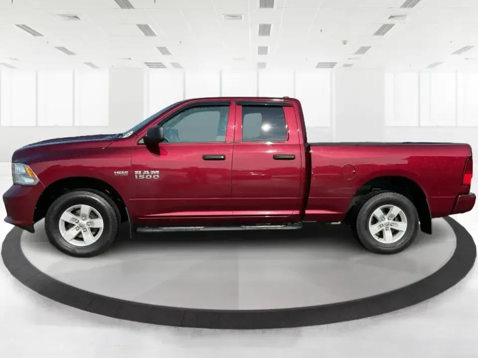 2018 Ram 1500 Express Quad Cab 4x4 6'4 Box (1C6RR7FT8JS) with an 5.7L V8 OHV 16V engine, 8A transmission, located at 1099 N County Rd 25A, Troy, OH, 45373, (937) 908-9800, 40.057079, -84.212883 - Are you ready to elevate your adventures and tackle any terrain with confidence? The 2018 Ram 1500 Express Quad Cab 4x4 is the ultimate truck for weekend warriors and daily commuters alike, offering the perfect blend of power, versatility, and style. With a striking Delmonico Red Pearlcoat exterior - Photo#5