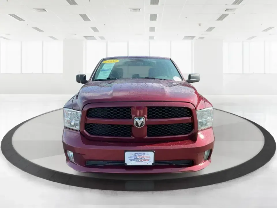 2018 Ram 1500 Express Quad Cab 4x4 6'4 Box (1C6RR7FT8JS) with an 5.7L V8 OHV 16V engine, 8A transmission, located at 8750 N County Rd 25A, Piqua, OH, 45356, (937) 908-9800, 40.164391, -84.232513 - Are you ready to elevate your adventures and tackle any terrain with confidence? The 2018 Ram 1500 Express Quad Cab 4x4 is the ultimate truck for weekend warriors and daily commuters alike, offering the perfect blend of power, versatility, and style. With a striking Delmonico Red Pearlcoat exterior - Photo#7