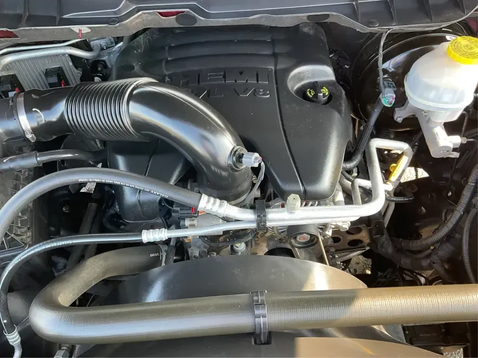 2018 Ram 1500 Express Quad Cab 4x4 6'4 Box (1C6RR7FT8JS) with an 5.7L V8 OHV 16V engine, 8A transmission, located at 8750 N County Rd 25A, Piqua, OH, 45356, (937) 908-9800, 40.164391, -84.232513 - Are you ready to elevate your adventures and tackle any terrain with confidence? The 2018 Ram 1500 Express Quad Cab 4x4 is the ultimate truck for weekend warriors and daily commuters alike, offering the perfect blend of power, versatility, and style. With a striking Delmonico Red Pearlcoat exterior - Photo#11