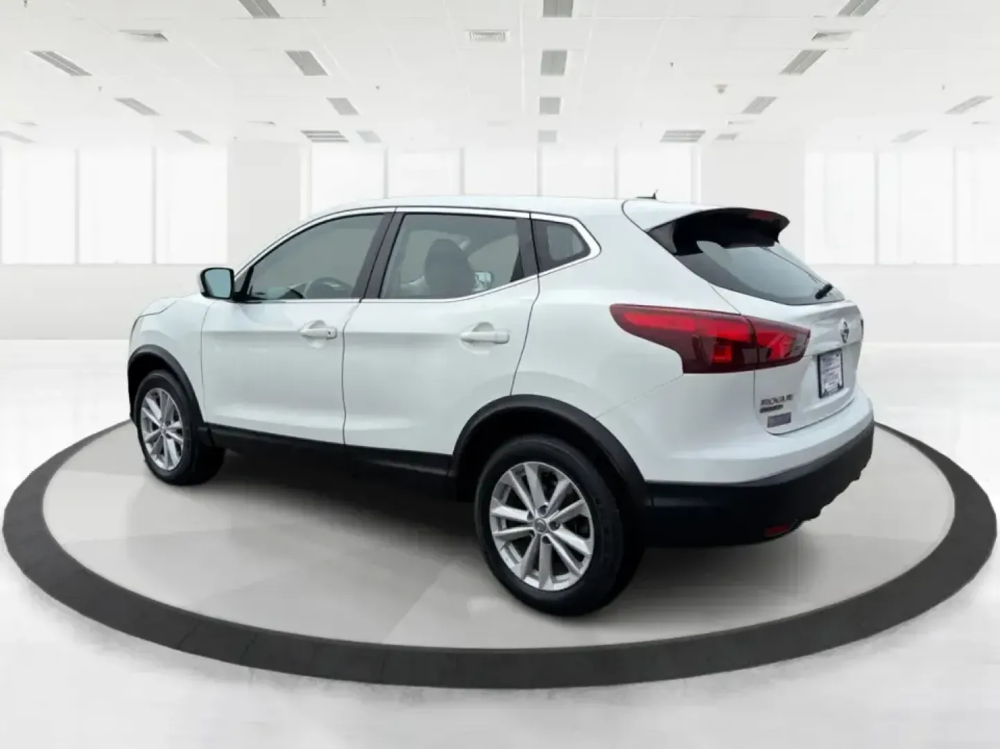 2018 Nissan Rogue S (JN1BJ1CRXJW) with an 2L I-4 gasoline direct injection engine, CVT transmission, located at 1099 N County Rd 25A, Troy, OH, 45373, (937) 908-9800, 40.057079, -84.212883 - Pack up the kids, load the groceries, or point the hood toward a weekend getaway-this 2018 Nissan Rogue S in Glacier White is the kind of everyday SUV that fits real life in Troy. With a comfortable cabin, practical cargo space, and confidence-inspiring AWD capability, it's ideal for long commutes, - Photo#4