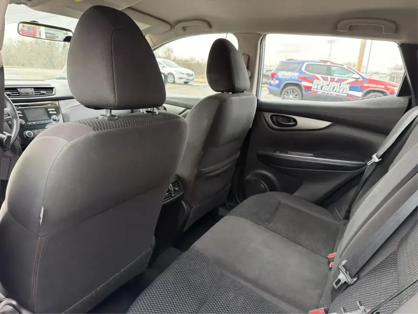 2018 Nissan Rogue S (JN1BJ1CRXJW) with an 2L I-4 gasoline direct injection engine, CVT transmission, located at 1099 N County Rd 25A, Troy, OH, 45373, (937) 908-9800, 40.057079, -84.212883 - Pack up the kids, load the groceries, or point the hood toward a weekend getaway-this 2018 Nissan Rogue S in Glacier White is the kind of everyday SUV that fits real life in Troy. With a comfortable cabin, practical cargo space, and confidence-inspiring AWD capability, it's ideal for long commutes, - Photo#10