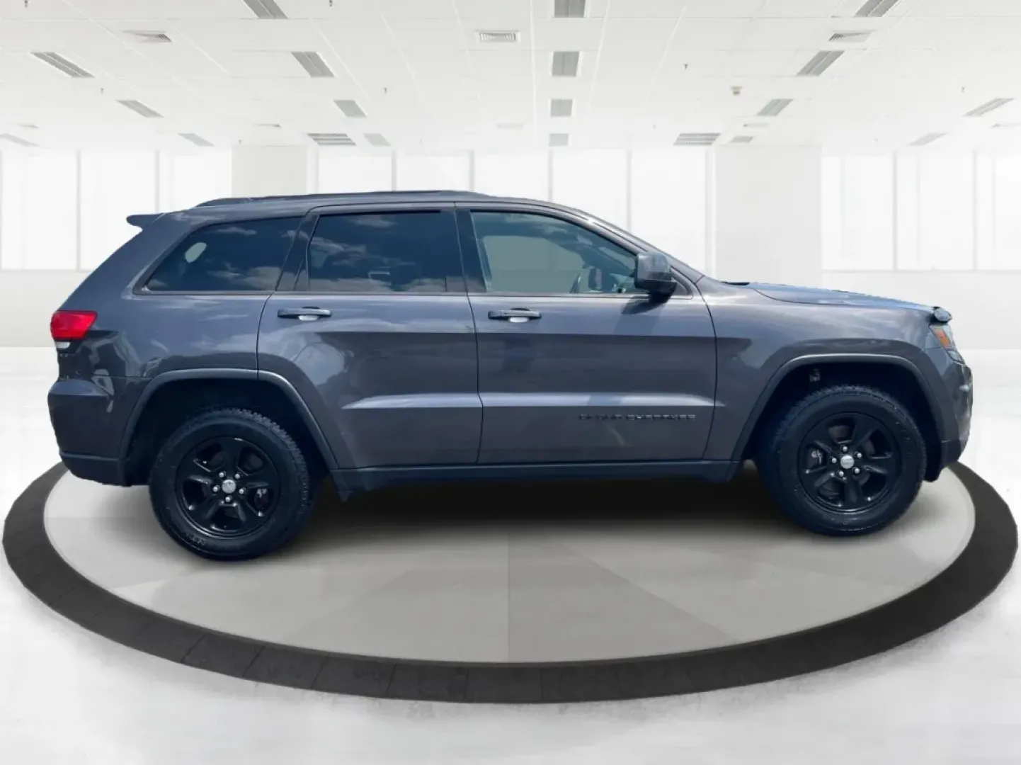 2016 Jeep Grand Cherokee Laredo (1C4RJFAG8GC) with an Pentastar 3.6L V-6 DOHC engine, located at 880 E. National Road, Vandalia, OH, 45377, (937) 908-9800, 39.891918, -84.183594 - **Elevate Your Adventures with the 2016 Jeep Grand Cherokee Laredo!**<br /> <br /> Are you ready to embark on your next adventure? Whether you're a growing family needing more space for weekend getaways or a commuter seeking a reliable ride for daily travels, the 2016 Jeep Grand Cherokee Laredo is y - Photo#1