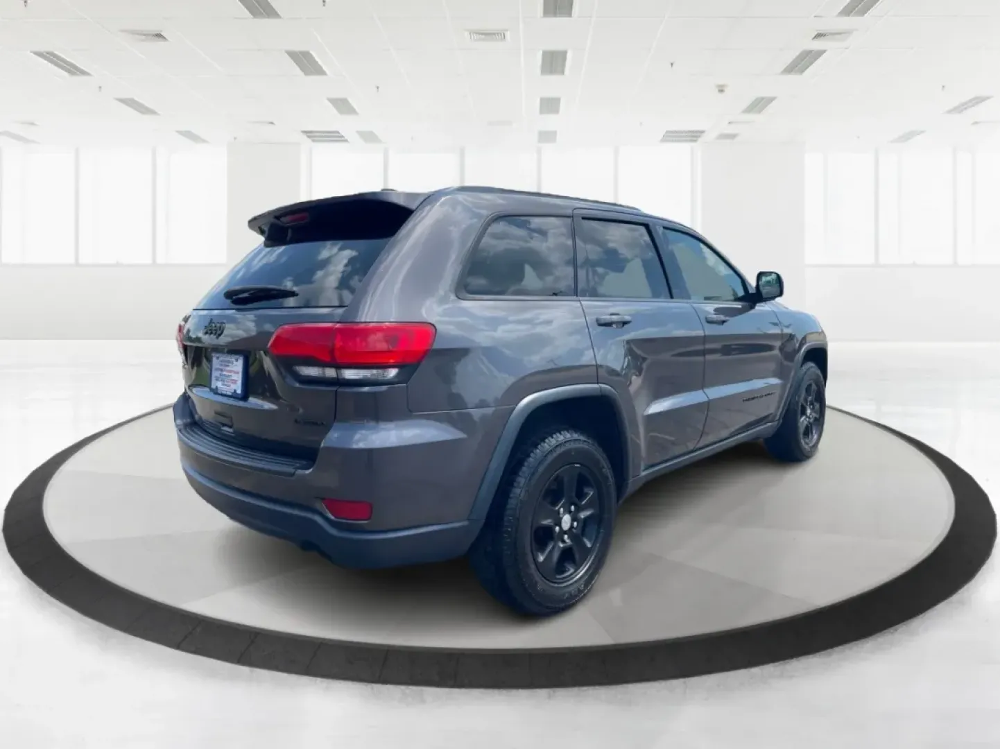2016 Jeep Grand Cherokee Laredo (1C4RJFAG8GC) with an Pentastar 3.6L V-6 DOHC engine, located at 880 E. National Road, Vandalia, OH, 45377, (937) 908-9800, 39.891918, -84.183594 - **Elevate Your Adventures with the 2016 Jeep Grand Cherokee Laredo!**<br /> <br /> Are you ready to embark on your next adventure? Whether you're a growing family needing more space for weekend getaways or a commuter seeking a reliable ride for daily travels, the 2016 Jeep Grand Cherokee Laredo is y - Photo#2