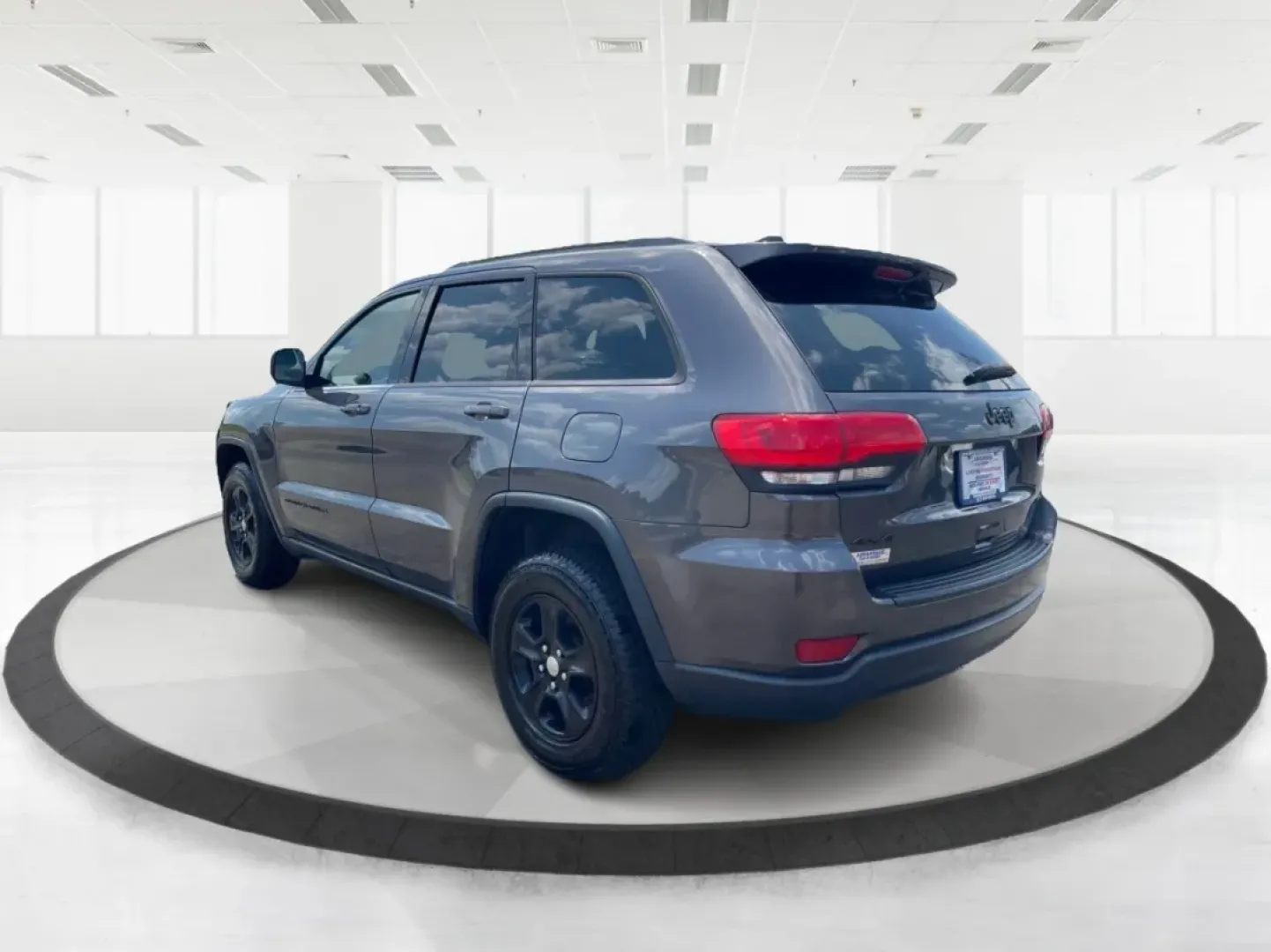 2016 Jeep Grand Cherokee Laredo (1C4RJFAG8GC) with an Pentastar 3.6L V-6 DOHC engine, located at 880 E. National Road, Vandalia, OH, 45377, (937) 908-9800, 39.891918, -84.183594 - **Elevate Your Adventures with the 2016 Jeep Grand Cherokee Laredo!**<br /> <br /> Are you ready to embark on your next adventure? Whether you're a growing family needing more space for weekend getaways or a commuter seeking a reliable ride for daily travels, the 2016 Jeep Grand Cherokee Laredo is y - Photo#4