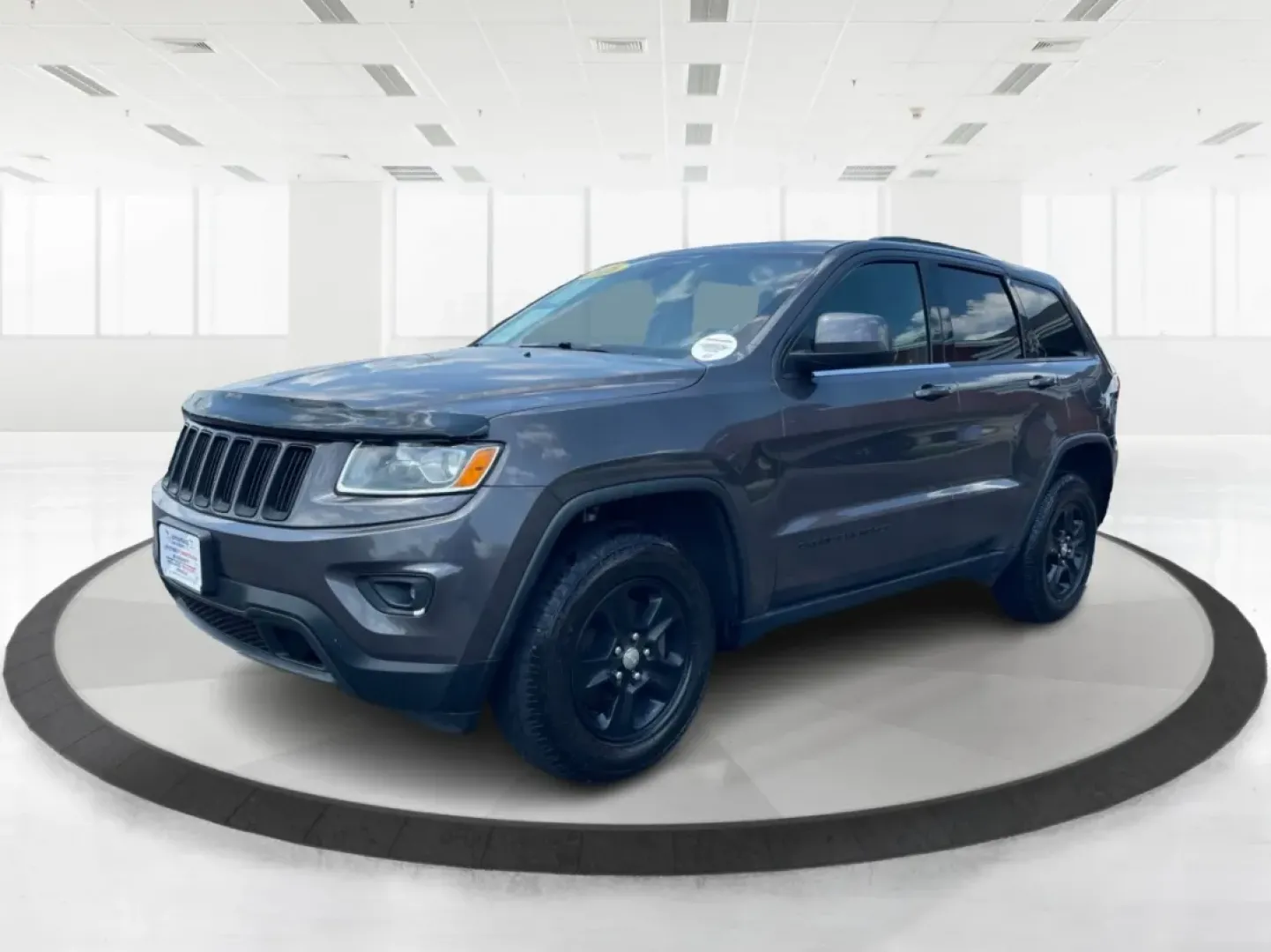2016 Jeep Grand Cherokee Laredo (1C4RJFAG8GC) with an Pentastar 3.6L V-6 DOHC engine, located at 880 E. National Road, Vandalia, OH, 45377, (937) 908-9800, 39.891918, -84.183594 - **Elevate Your Adventures with the 2016 Jeep Grand Cherokee Laredo!**<br /> <br /> Are you ready to embark on your next adventure? Whether you're a growing family needing more space for weekend getaways or a commuter seeking a reliable ride for daily travels, the 2016 Jeep Grand Cherokee Laredo is y - Photo#8