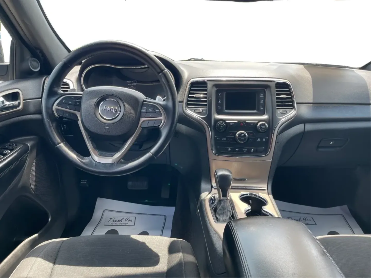 2016 Jeep Grand Cherokee Laredo (1C4RJFAG8GC) with an Pentastar 3.6L V-6 DOHC engine, located at 880 E. National Road, Vandalia, OH, 45377, (937) 908-9800, 39.891918, -84.183594 - **Elevate Your Adventures with the 2016 Jeep Grand Cherokee Laredo!**<br /> <br /> Are you ready to embark on your next adventure? Whether you're a growing family needing more space for weekend getaways or a commuter seeking a reliable ride for daily travels, the 2016 Jeep Grand Cherokee Laredo is y - Photo#21