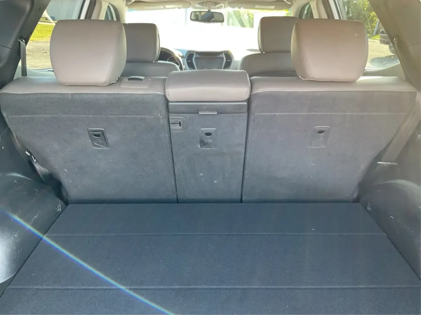 2013 Hyundai Santa Fe Sport (5XYZU3LB9DG) with an Theta II 2.4L I-4 gasoline direct injection engine, located at 4508 South Dixie Dr, Moraine, OH, 45439, (937) 908-9800, 39.689976, -84.218452 - **Adventure Awaits with the 2013 Hyundai Santa Fe Sport at Advantage Car and Credit Moraine!**<br /> <br /> Are you looking for a versatile SUV that can handle all of life's adventures? Whether you're carting the family to soccer practice, going on weekend camping trips, or commuting to work every - Photo#11