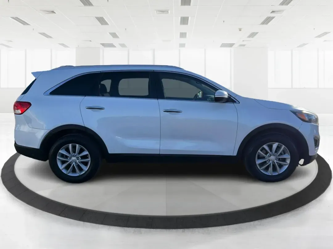 2016 Kia Sorento 2.4L LX (5XYPG4A39GG) with an 2.4L I-4 gasoline direct injection engine, located at 4508 South Dixie Dr, Moraine, OH, 45439, (937) 908-9800, 39.689976, -84.218452 - **Discover the Perfect Family SUV for Your Next Adventure!**<br /> <br /> Are you in search of a reliable SUV that can comfortably accommodate your growing family while also being great for weekend getaways? Look no further than the 2016 Kia Sorento 2.4L LX, available now at Advantage Car and Credit - Photo#1