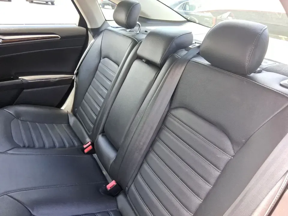 2016 Ford Fusion SE (3FA6P0HD7GR) with an 1.5L L4 DOHC 16V engine, 6-Speed Automatic transmission, located at 1099 N County Rd 25A, Troy, OH, 45373, (937) 908-9800, 40.057079, -84.212883 - Experience the perfect blend of style, comfort, and reliability with this 2016 Ford Fusion SE, available now at Advantage Car and Credit in Fairborn, OH. Whether you're a commuter navigating the busy streets of downtown Fairborn or a growing family looking for a dependable vehicle for your weekend a - Photo#10