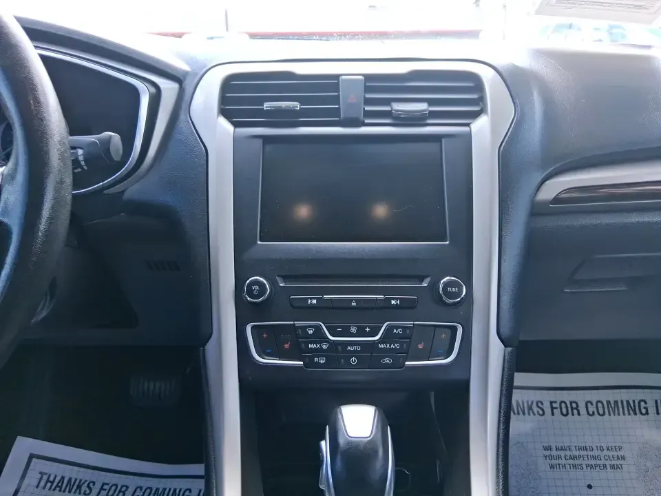 2016 Ford Fusion SE (3FA6P0HD7GR) with an 1.5L L4 DOHC 16V engine, 6-Speed Automatic transmission, located at 1099 N County Rd 25A, Troy, OH, 45373, (937) 908-9800, 40.057079, -84.212883 - Experience the perfect blend of style, comfort, and reliability with this 2016 Ford Fusion SE, available now at Advantage Car and Credit in Fairborn, OH. Whether you're a commuter navigating the busy streets of downtown Fairborn or a growing family looking for a dependable vehicle for your weekend a - Photo#13