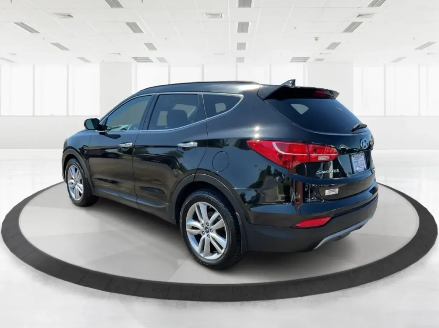 2014 Hyundai Santa Fe 2.0L Turbo (5XYZUDLA5EG) with an Theta II 2L I-4 gasoline direct injection engine, located at 8750 N County Rd 25A, Piqua, OH, 45356, (937) 908-9800, 40.164391, -84.232513 - Experience the thrill of adventure and family outings with our stunning 2014 Hyundai Santa Fe, available now at Advantage Car and Credit - Piqua, your friendly Buy Here Pay Here dealership located at 8750 N County Rd 25A, Piqua, OH 45356. This versatile SUV is designed for those who crave comfort, r - Photo#4