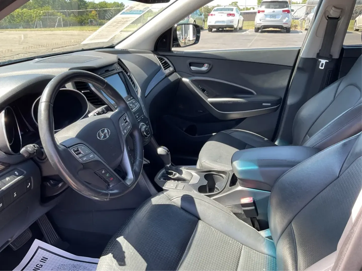 2014 Hyundai Santa Fe 2.0L Turbo (5XYZUDLA5EG) with an Theta II 2L I-4 gasoline direct injection engine, located at 8750 N County Rd 25A, Piqua, OH, 45356, (937) 908-9800, 40.164391, -84.232513 - Experience the thrill of adventure and family outings with our stunning 2014 Hyundai Santa Fe, available now at Advantage Car and Credit - Piqua, your friendly Buy Here Pay Here dealership located at 8750 N County Rd 25A, Piqua, OH 45356. This versatile SUV is designed for those who crave comfort, r - Photo#9