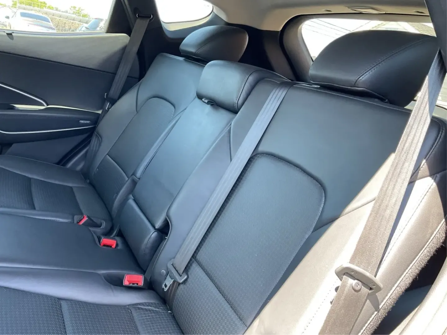 2014 Hyundai Santa Fe 2.0L Turbo (5XYZUDLA5EG) with an Theta II 2L I-4 gasoline direct injection engine, located at 8750 N County Rd 25A, Piqua, OH, 45356, (937) 908-9800, 40.164391, -84.232513 - Experience the thrill of adventure and family outings with our stunning 2014 Hyundai Santa Fe, available now at Advantage Car and Credit - Piqua, your friendly Buy Here Pay Here dealership located at 8750 N County Rd 25A, Piqua, OH 45356. This versatile SUV is designed for those who crave comfort, r - Photo#10