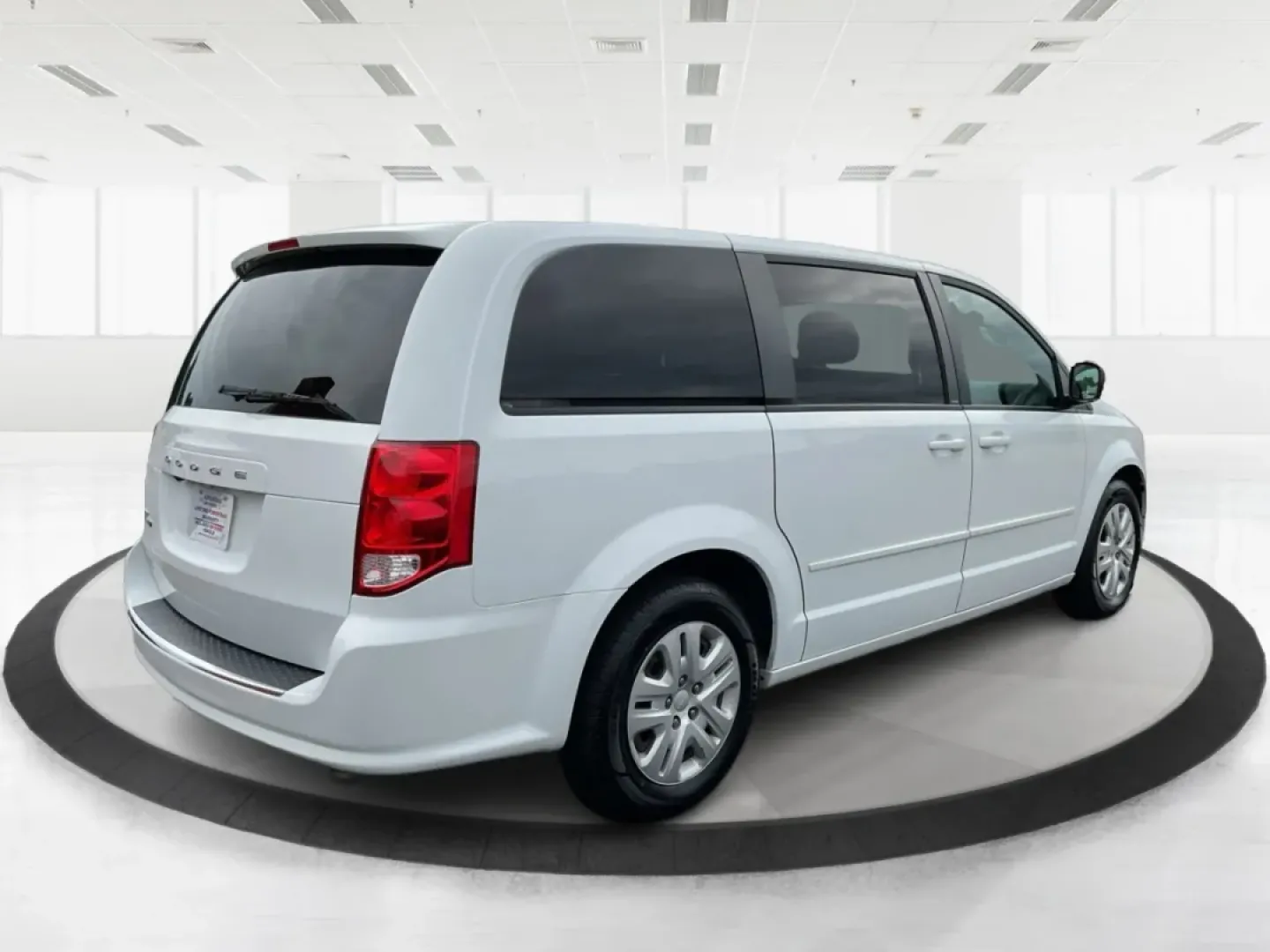 2014 Dodge Grand Caravan SE (2C4RDGBG7ER) with an 3.6L V-6 DOHC engine, located at 880 E. National Road, Vandalia, OH, 45377, (937) 908-9800, 39.891918, -84.183594 - Are you ready to elevate your family's adventures? Look no further than the 2014 Dodge Grand Caravan SE, an exceptional passenger van that perfectly balances comfort, convenience, and capability for growing families or those needing spacious transportation. Whether you're planning weekend getaways, - Photo#2