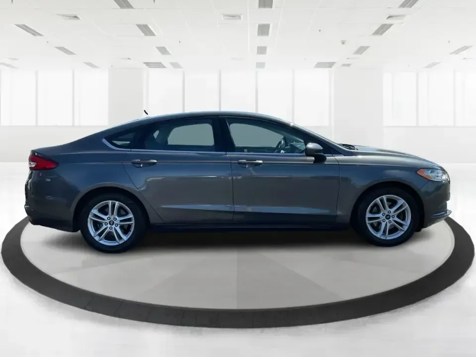 2018 Ford Fusion SE (3FA6P0HD3JR) with an 1.5L L4 DOHC 16V engine, 6A transmission, located at 1230 East Main St, Xenia, OH, 45385, (937) 908-9800, 39.688026, -83.910172 - Looking for a reliable sedan that combines style, comfort, and practicality? Look no further than the 2018 Ford Fusion SE, available now at Advantage Car and Credit in Vandalia, OH! Perfect for your daily commute, family outings, or even weekend adventures, this vehicle is designed to enhance your l - Photo#1