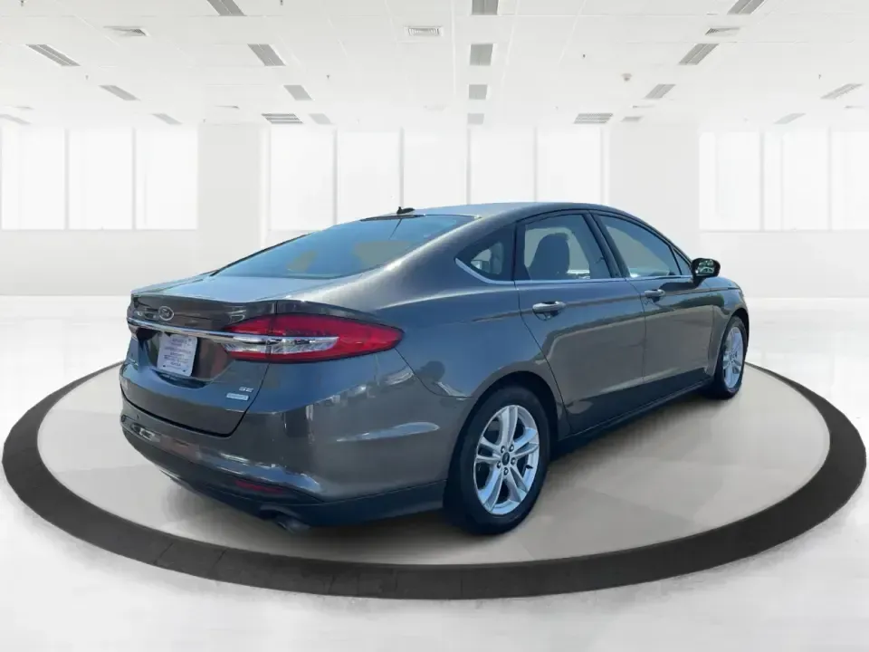 2018 Ford Fusion SE (3FA6P0HD3JR) with an 1.5L L4 DOHC 16V engine, 6A transmission, located at 8750 N County Rd 25A, Piqua, OH, 45356, (937) 908-9800, 40.164391, -84.232513 - Looking for a reliable sedan that combines style, comfort, and practicality? Look no further than the 2018 Ford Fusion SE, available now at Advantage Car and Credit in Vandalia, OH! Perfect for your daily commute, family outings, or even weekend adventures, this vehicle is designed to enhance your l - Photo#2
