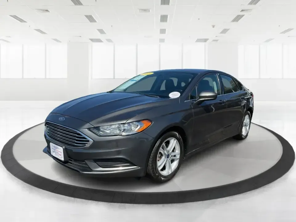 2018 Ford Fusion SE (3FA6P0HD3JR) with an 1.5L L4 DOHC 16V engine, 6A transmission, located at 8750 N County Rd 25A, Piqua, OH, 45356, (937) 908-9800, 40.164391, -84.232513 - Looking for a reliable sedan that combines style, comfort, and practicality? Look no further than the 2018 Ford Fusion SE, available now at Advantage Car and Credit in Vandalia, OH! Perfect for your daily commute, family outings, or even weekend adventures, this vehicle is designed to enhance your l - Photo#8