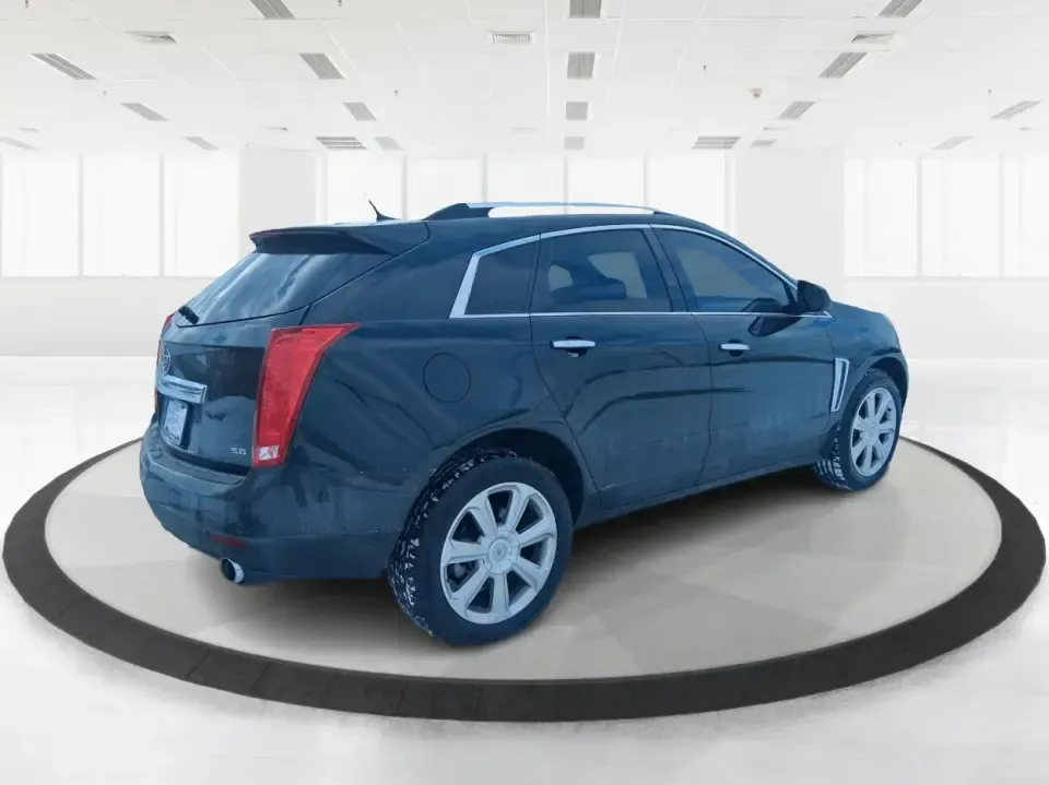 2014 Cadillac SRX Performance Collection (3GYFNCE38ES) with an 3.6L V-6 gasoline direct injection engine, located at 8750 N County Rd 25A, Piqua, OH, 45356, (937) 908-9800, 40.164391, -84.232513 - **Experience Luxury and Versatility with the 2014 Cadillac SRX Performance Collection at Advantage Car and Credit - Riverside!**<br /> <br /> Are you in search of a vehicle that accommodates both your daily commutes and weekend adventures while ensuring you travel in style? Look no further than the - Photo#2