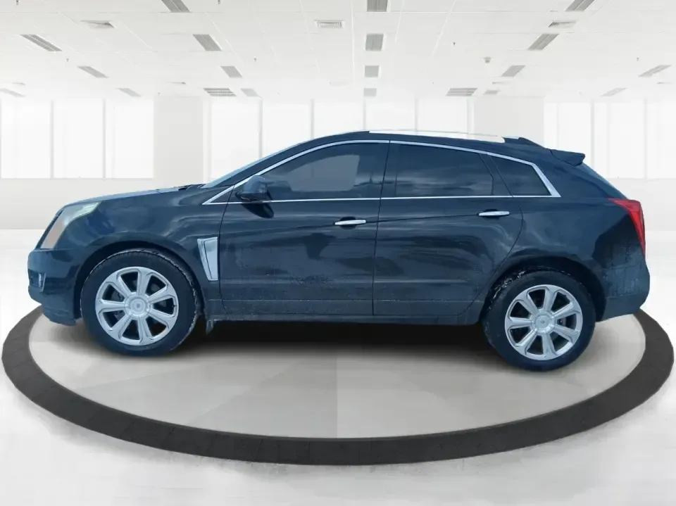 2014 Cadillac SRX Performance Collection (3GYFNCE38ES) with an 3.6L V-6 gasoline direct injection engine, located at 8750 N County Rd 25A, Piqua, OH, 45356, (937) 908-9800, 40.164391, -84.232513 - **Experience Luxury and Versatility with the 2014 Cadillac SRX Performance Collection at Advantage Car and Credit - Riverside!**<br /> <br /> Are you in search of a vehicle that accommodates both your daily commutes and weekend adventures while ensuring you travel in style? Look no further than the - Photo#5
