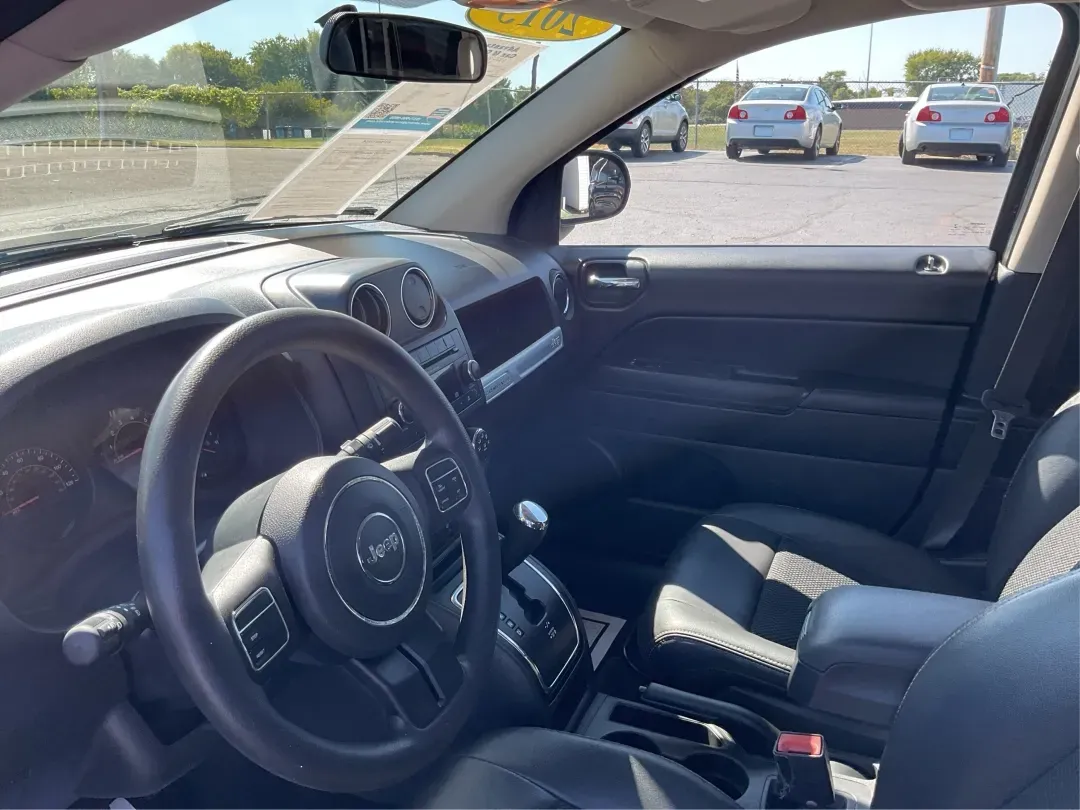 2015 Jeep Compass Altitude Edition (1C4NJCBA6FD) with an 2L I-4 DOHC engine, located at 8750 N County Rd 25A, Piqua, OH, 45356, (937) 908-9800, 40.164391, -84.232513 - **Adventure Awaits in the 2015 Jeep Compass Altitude Edition at Advantage Car and Credit - Fairborn!**<br /> <br /> Are you ready for your next adventure? The 2015 Jeep Compass Altitude Edition is your perfect companion for weekend getaways, family road trips, or even your daily commute! This versat - Photo#9