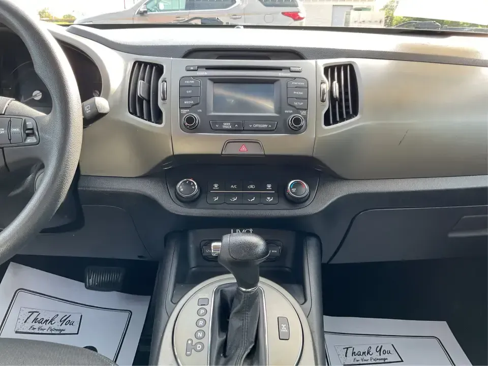 2015 Kia Sportage LX (KNDPBCAC2F7) with an 2.4L V6 DOHC 24V engine, 6-Speed Automatic transmission, located at 1099 N County Rd 25A, Troy, OH, 45373, (937) 908-9800, 40.057079, -84.212883 - Are you ready to elevate your driving experience and embark on unforgettable adventures? Look no further than this 2015 Kia Sportage LX, perfect for those who crave a reliable crossover that blends style with versatility. Whether you're commuting to work, shuttling the kids to school, or planning a - Photo#13